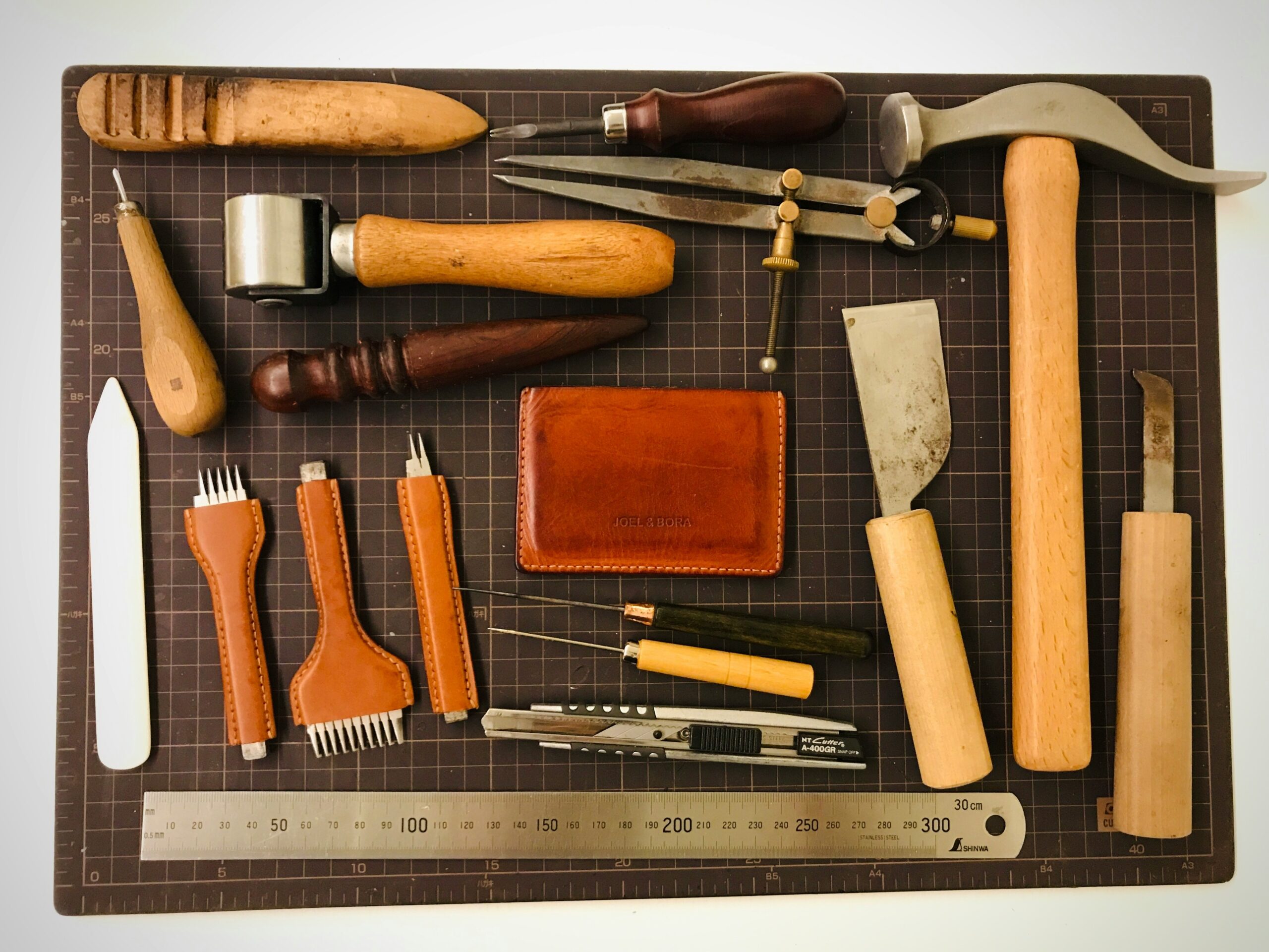Photo of a professional-grade grooming kit featuring multiple tools, including one with detachable blades.