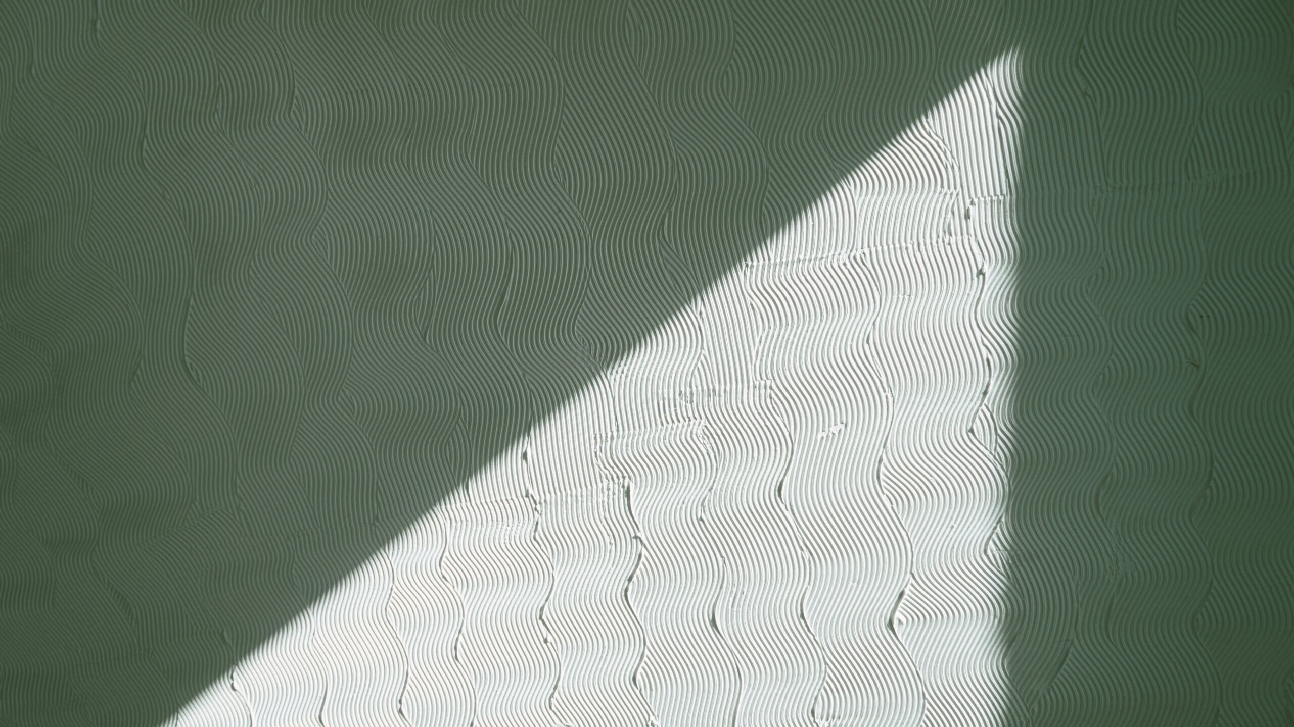 white textile on green textile