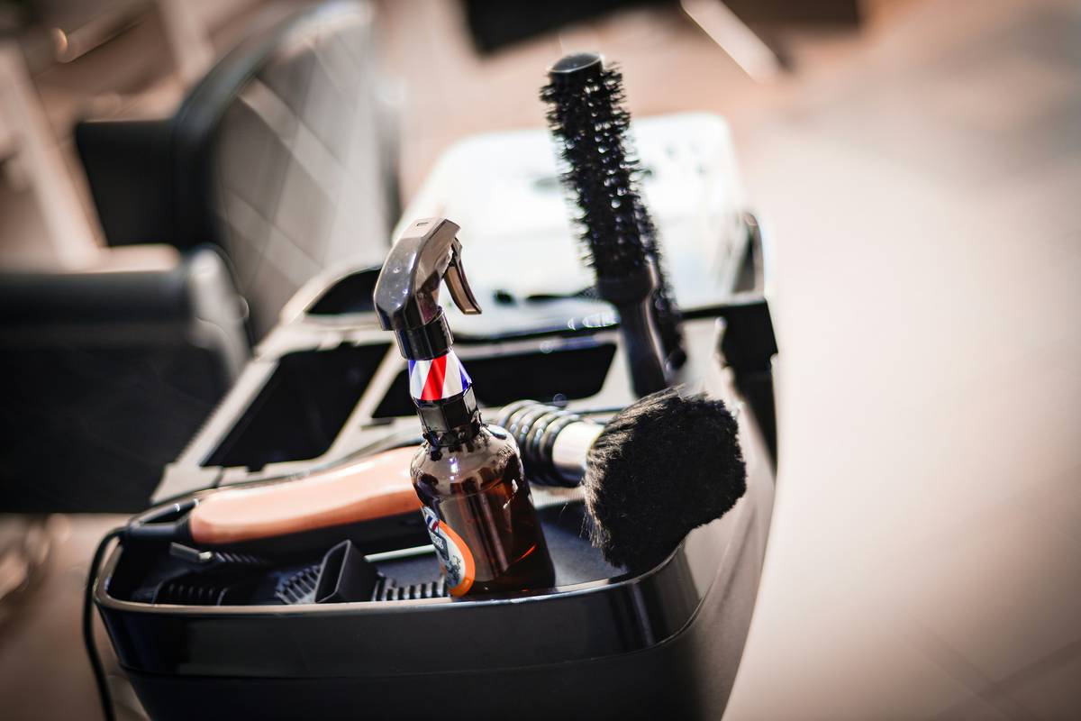 A close-up of a high-quality mat splitter tool designed for pet grooming